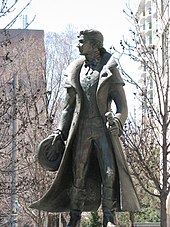 Statue of Alexander Wood in the neighbourhood. A lieutenant in the Canadian militia who was later involved in a homophobic scandal, he is now lauded as a forefather of Toronto's gay community. Statue of Alexander Wood, Alexander Street, Toronto, Canada IMG 5696.jpg