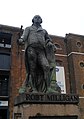 The statue of Robert Milligan in West India Docks, created in 1813.