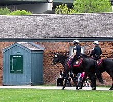 Mounted officers of the Toronto Police Service, one of three emergency service providers operated by the municipal government. Toronto Police Mounted Unit - panoramio.jpg