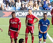 Chelsea 4 vs. 2 Watford. From left to right: Troy Deeney, Richarlison and Cesc Fàbregas (21 October 2017)