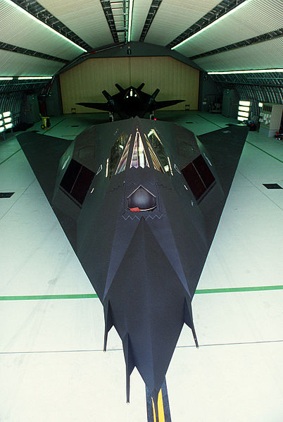 File:Two 37th Tactical Fighter Wing (37th TFW) F-117A aircraft sit inside a hangar during Operation Desert Shield DF-ST-91-03327.jpg