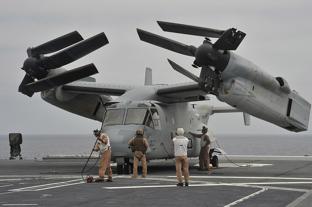 V22 Osprey 1024px-U.S._Marines_inspect_an_MV-22_Osprey_tilt-rotor_aircraft