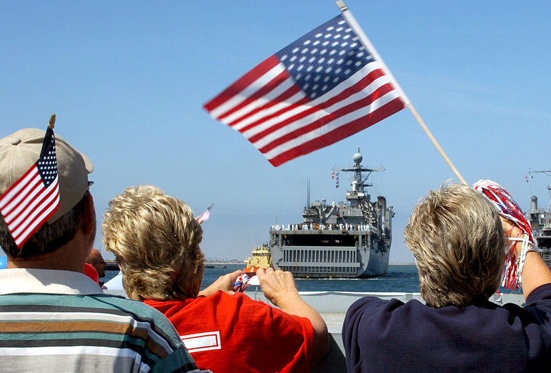 File:US Navy 070531-N-4163T-180 Family and friends cheer as the dock landing ship USS Comstock (LSD 45) pulls into port at Naval Base San Diego.jpg