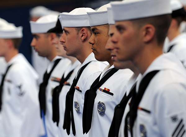 Sailors of the US Navy in Service Dress White Uniforms with their neckerchiefs