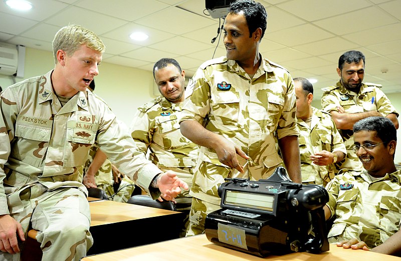 File:US Navy 111115-N-RP435-143 Explosive Ordnance Disposal 1st Class Carey Peekstock shows Royal Bahrain Army explosive ordnance technicians a handheld.jpg