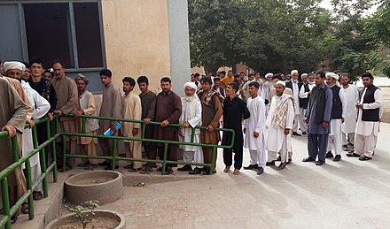 Voters queuing up in front of a polling center in western Herat province. Voters queuing up in front of a polling center in western Herat province.jpg