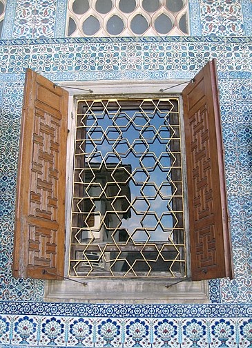A window of the crown prince's apartment in the Topkapı Palace, Istanbul, Turkey, with 6-point stars; the surrounds have floral arabesque tiling
