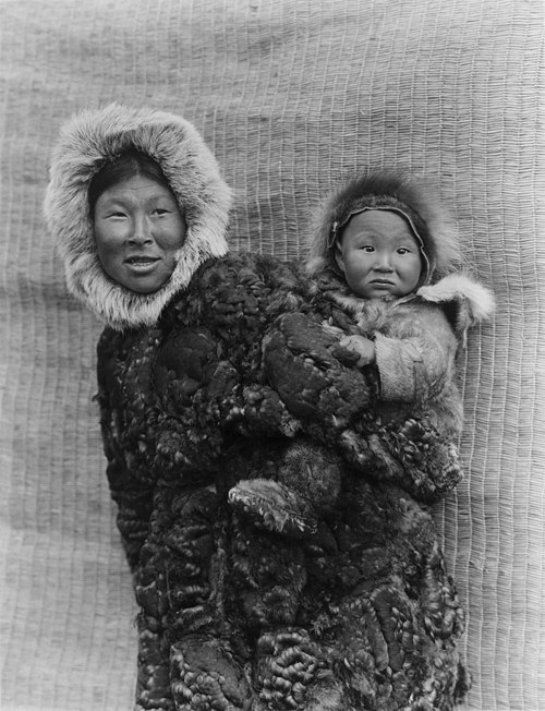 Yupik mother and child, Nunivak Island, c. 1929; photographed by Edward S. Curtis.