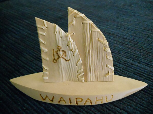 Souvenir miniature wooden boat from Waipahu