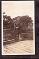 "Sgt C. Devos, Dorval, Quebec" Sergeant Devos standing on a wooden bridge. (3548756979).jpg