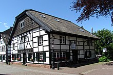 Half-timbered semi-detached house