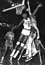 Bellamy (No. 8) averaged 31.6 points per game and 19.0 rebounds per game during his rookie season 1961 Chicago Packers vs. Boston Celtics.jpeg