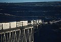 3 Santa Fe Trains Crossing the Colorado River at Sunrise - 5 Photos (31266681855).jpg