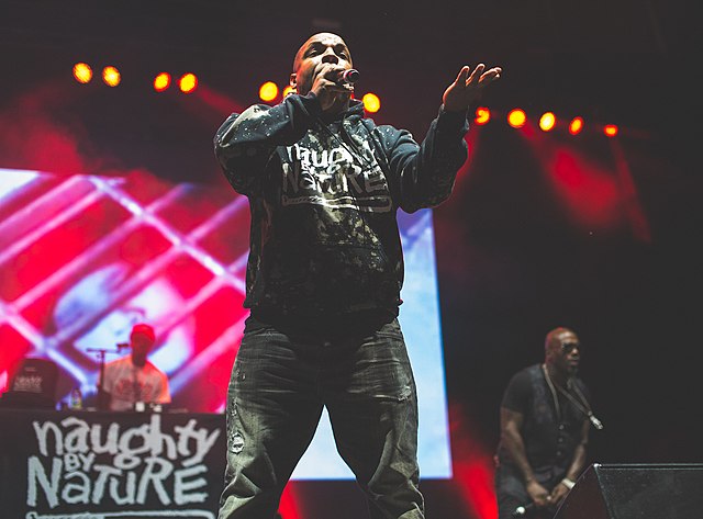 Naughty by Nature performing in 2016; Vin Rock in foreground.