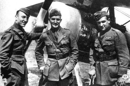 Aces Eddie Rickenbacker, Douglas Campbell, and Kenneth Marr of the 94th Aero Squadron pose next to a Nieuport 28.