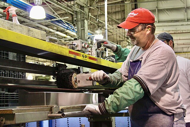 A Whirlpool employee creates appliances at the Cleveland, Tennessee, plant on Oct. 1, 2010