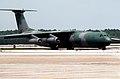A right front view of a C-141 Starlifter aircraft at the base during Exercise OCEAN VENTURE '84 - DPLA - 370008c85c116257f2f13f046580dded.jpeg