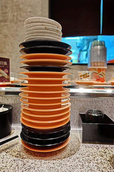 File:A stack of empty sushi plates at a conveyor belt sushi restaurant in Taiwan.jpg