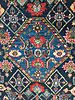 Section (central medallion) of a South Persian rug, probably Qashqai, late 19th century, showing irregular blue colours (abrash)