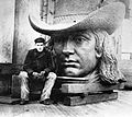 Tacony Iron Works employee, 18-year-old Frederik Ullberg with the head of Alexander Milne Calder's statue of William Penn.
