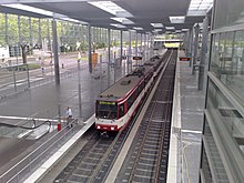 A train of the Düsseldorf Stadtbahn at Merkur Spiel-Arena/Messe Nord station