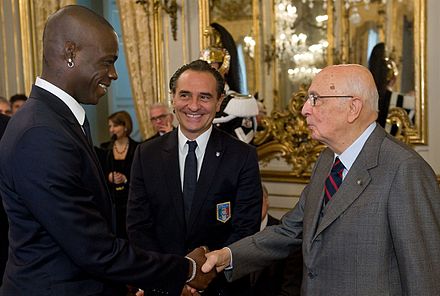 Mario Balotelli (left) and Cesare Prandelli (centre) meeting the then Italian President Giorgio Napolitano (right) in November 2011