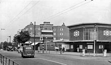 Station entrance viewing northwards in 1955, showing the unique eight-sided station building. Bounds Green (Underground) Station 1860914 2020553d.jpg