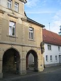 House in a corner, with figure of St.  Nepomuk