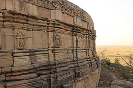 Outer facade has recesses and projections with small rathas and deities carved into them