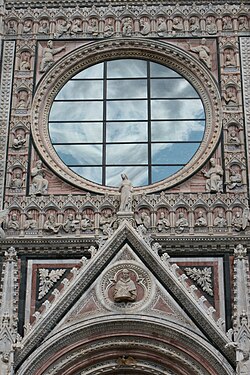 Duomo di Siena, clouds reflected in the rose window