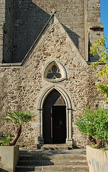 Le portail nord, postérieur à l'église.