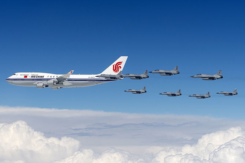 File:Eight Pakistan Air Force JF-17s escort Air China Boeing 747-400.jpg