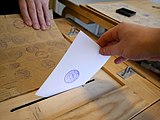 Ballot being dropped into a ballot box during the 2018 Finnish presidential election