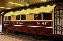 A Glasgow Subway 4-wheel carriage. GLASGOW SUBWAY CAR NO41T ON DISPLAY AT BUCHANAN STREET STATION GLASGOW SEP 2013 (9703635856).jpg