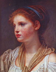 Young girl with blue ribbon