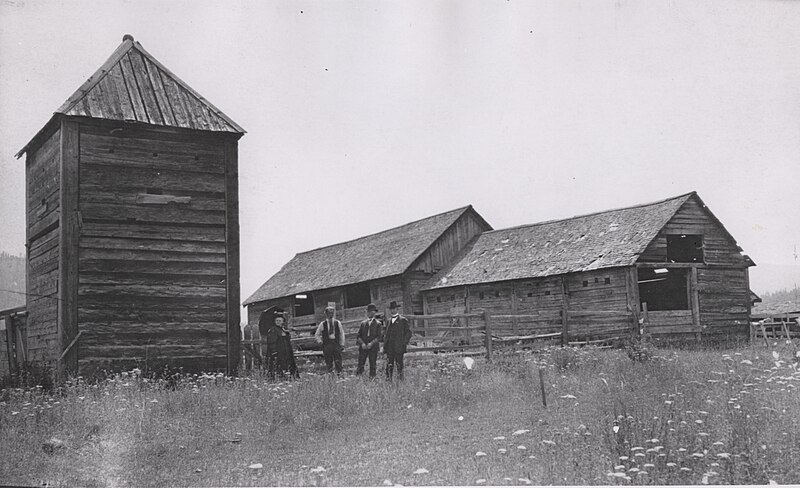 File:Group, including Senator Ankeny, standing before three of the buildings at Fort Colvile. Second from left probably Donald (6e4bb58f-124f-40f9-a479-0c35c5984205).jpg