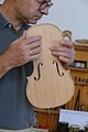 * Nomination In the workshop of Franz Übelhör, luthier in Linz, Austria - here Franz Übelhör is testing the sound of the top of the violin in its unfinished state --Kritzolina 17:41, 6 October 2023 (UTC) * Promotion Looks ok, but can you please add at least a "normal" category? --Poco a poco 07:19, 7 October 2023 (UTC) I had it under category:Violin contruction, but then the whole WikiCon category was moved in there by someone else, so the image was overcategorized. I could put it in economy of people of Linz, but this would be a bit shady categorizing in my eyes. I fail to find more ideas for "normal" categories, sorry. --Kritzolina 13:41, 7 October 2023 (UTC) To be honest, it wasn't so difficult --Poco a poco 15:24, 7 October 2023 (UTC) I have been thinking on this and decided to rename the WikiCon category. --Kritzolina 10:23, 10 October 2023 (UTC)  Support Good quality. --Poco a poco 17:04, 11 October 2023 (UTC)