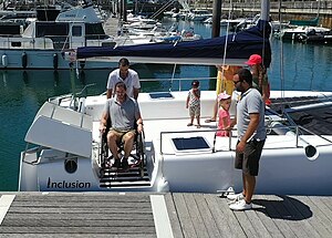 Inclusion catamaran door system.