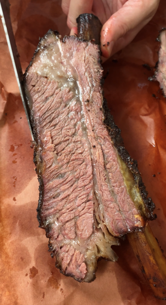 File:Inside of a beef rib cooked on a smoker grill.png