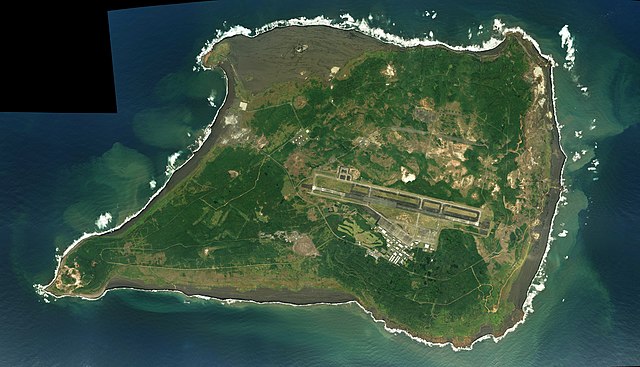Photo of Iwo Jima (Iōtō), c. 2016, with Mount Suribachi in the lower left hand corner