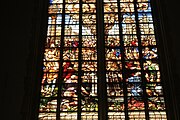 English: Detail of the stained-glass window number 23 in the Sint Janskerk at Gouda, Netherlands: Upper part - "Offering by the prophet Elijah"