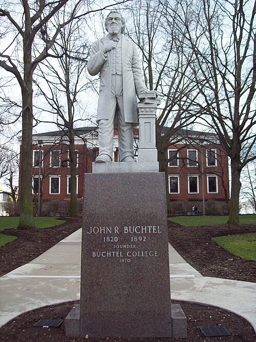 John R. Buchtel, in front of Buchtel Hall