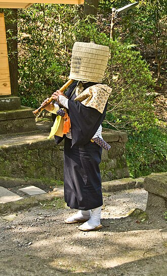 330px-Komuso_Buddhist_monk_beggar_Kita-kamakura