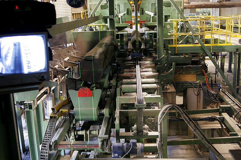 File:Laser guided cutting of wood inside modern woodmill.jpg