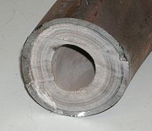Limescale build-up inside a pipe reduces both liquid flow and thermal conduction from the pipe, so will reduce thermal efficiency when used as a heat exchanger. Limescale-in-pipe.jpg