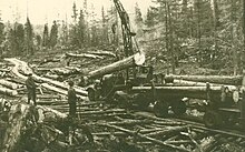 Lithuanian deportees preparing logs for rafting on the Mana River Logging at Small Ungut (no border).jpeg