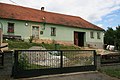 Čeština: Vesnice Skočova Lhota, část obce Malá Roudka v okrese Blansko. Statek čp. 1 v horní ulici.