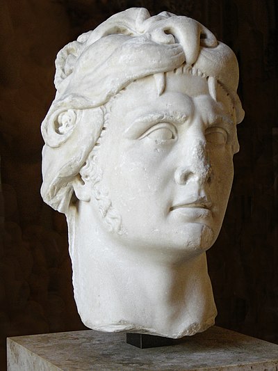 Bust of Mithridates VI sporting a lion pelt headdress, a symbol of Herakles.