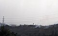 A distant view of Mōmōland Aburayama from Aburayama mountain path 油山遊歩道からのもーもーらんど油山牧場