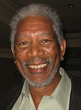 Morgan Freeman facing the camera and smiling